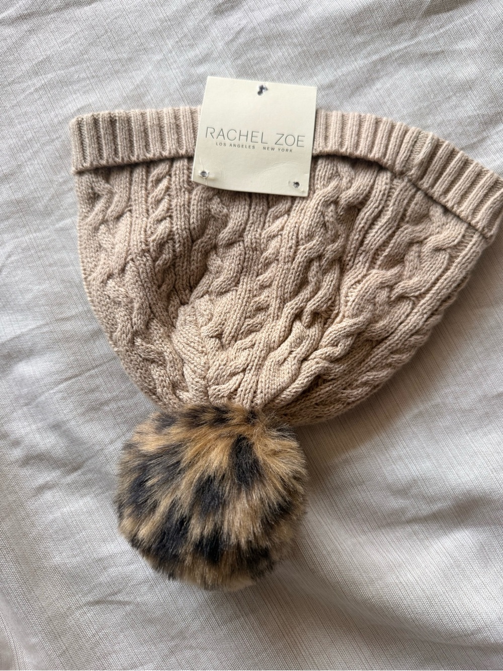 Rachel Zoe Beige Cable Knit Beanie with Leopard-Print Pom